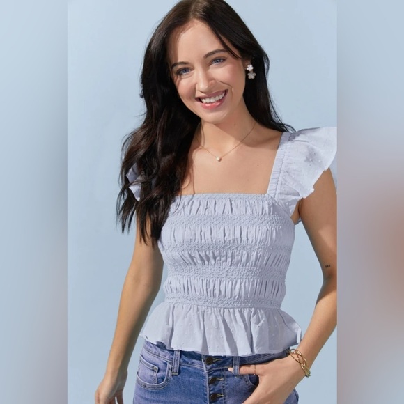 Francesca's Collections Tops - Small medium large xl Francesca’s new with tags smocked flutter sleeve top